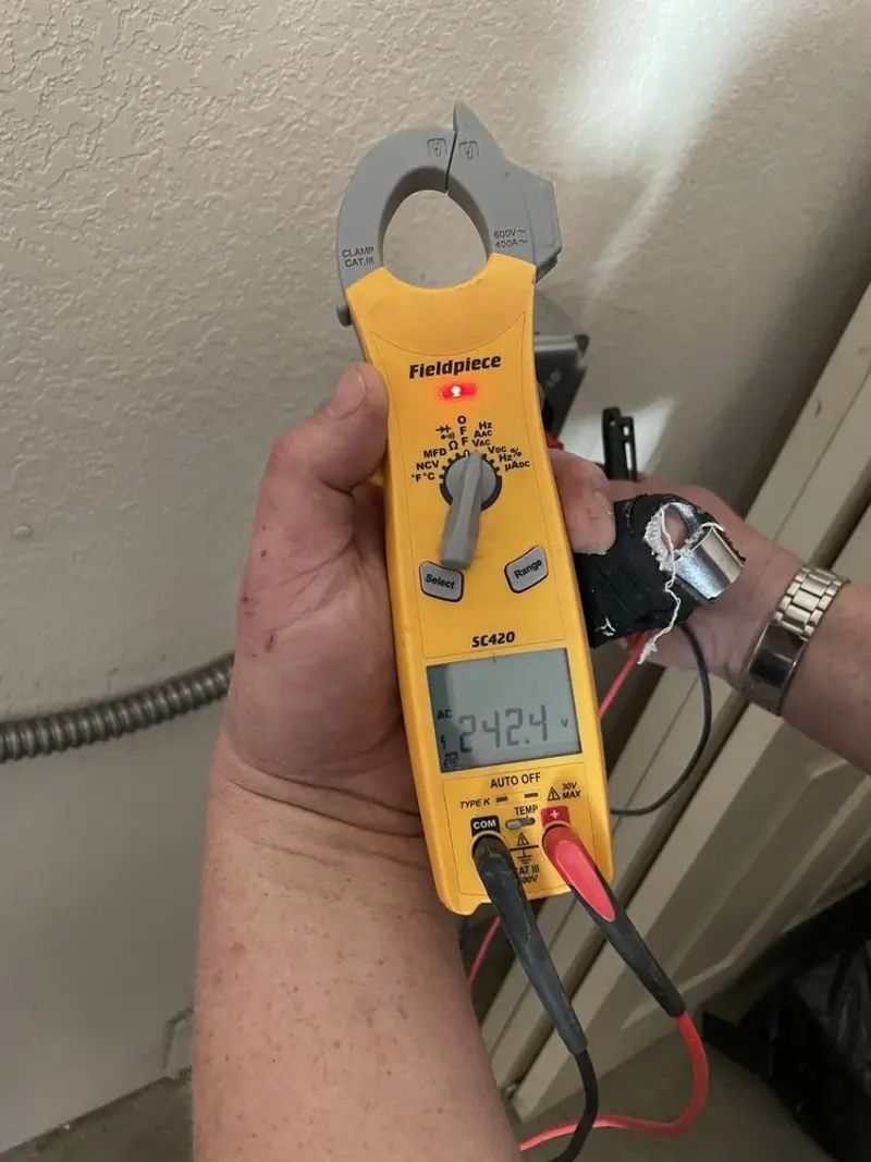 Voltage testing with clamp meter during Outlet Installation in Pleasanton